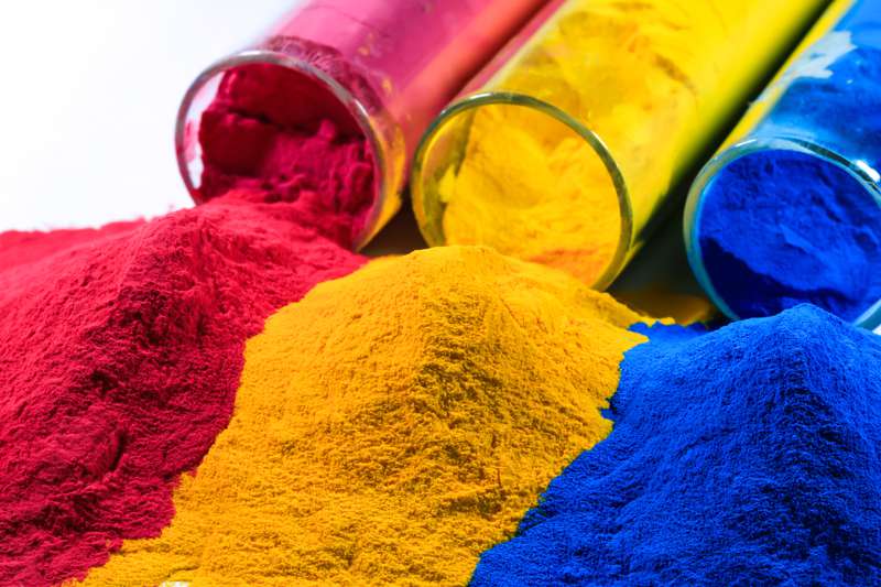 Powders of different colors in tubes for powder coating