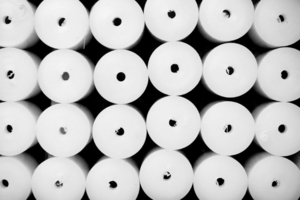 white polypropylene rolls stacked on a shelf