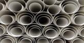 Polypropylene sheets rolled up into tubes stacked on each other