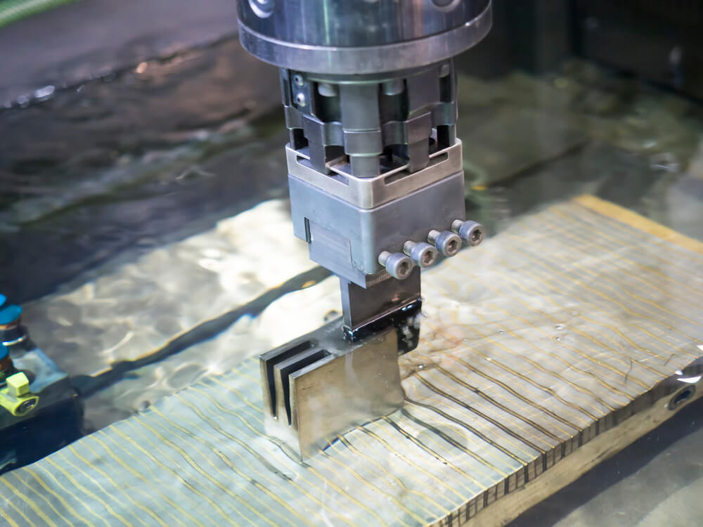 Operator use  EDM electrod to make precision mold and die — Photo